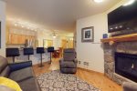 Tenderfoot Lodge 2 bedroom with a cozy living room and fireplace